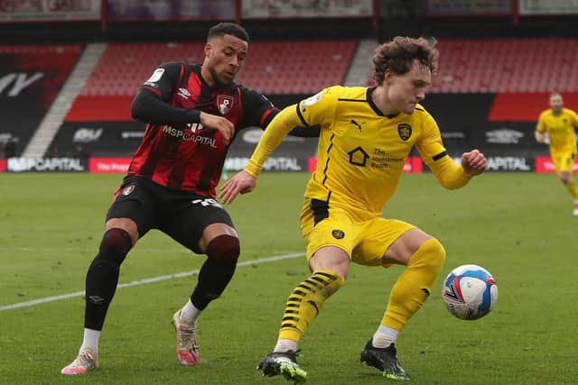 Going past: AFC Bournemouth's Arnaut Danjuma is foxed by  Barnsley's Callum Styles. Picture: PA