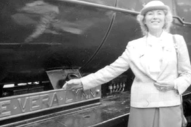Dame Vera Lynn with the locomotive named in her honour.