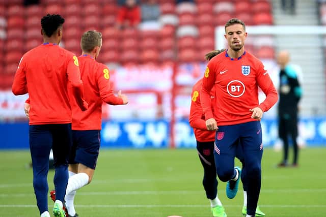 PREPARATIONS: England's Jordan Henderson warms up on the pitch ahead of the International Friendly at The Riverside Stadium, Middlesbrough. Picture: Lindsey Parnaby/PA Wire.