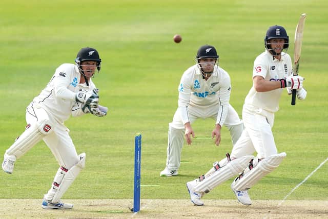 TESTING TIMES: England's Joe Root (right) strikes the ball during day two of the Test match against New Zealand at Lord's. Picture: Adam Davy/PA