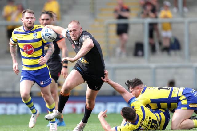 Attack: Castleford Tigers' Liam Watts drives on.