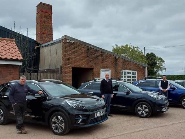 Steve Pittham (development manager), Alun Nixon (area sales manager), Guy Armitage (managing director) with the York Handmade Brick electric company cars