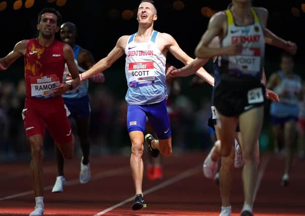 Great Britain's Marc Scott reacts as he crosses the finish line in the Men's International Race A, part of the 2021 Muller British Athletics 10,000m Championships and the European 10,000m Cup at University of Birmingham (Picture: Martin Rickett/PA Wire).