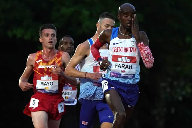 Great Britain's Sir Mo Farah (right) inthe European 10,000m Cup at University of Birmingham. (Picture Martin Rickett/PA Wire)