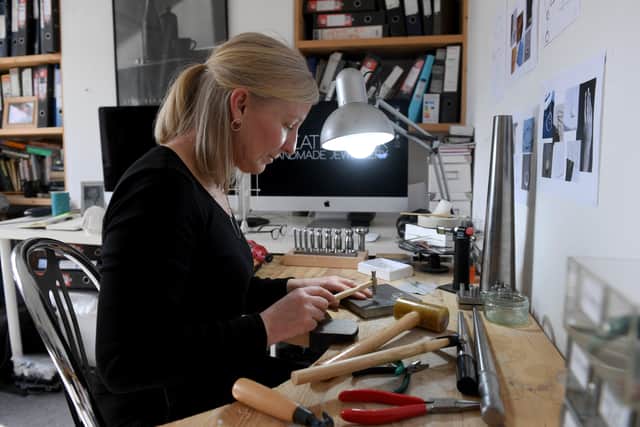 Sam at work at her jewellery bench at her home at Widdop near Hebden Bridge. Picture by Simon Hulme
