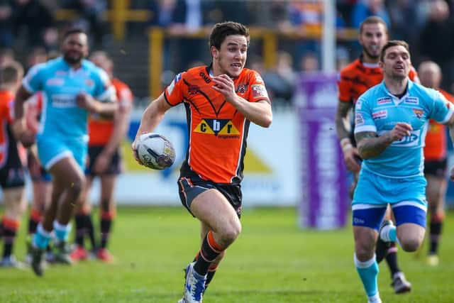 A young Tom Holmes makes a break for Castleford Tigers against Huddersfield Giants in 2016.  (ALEX WHITEHEAD/SWPIX)