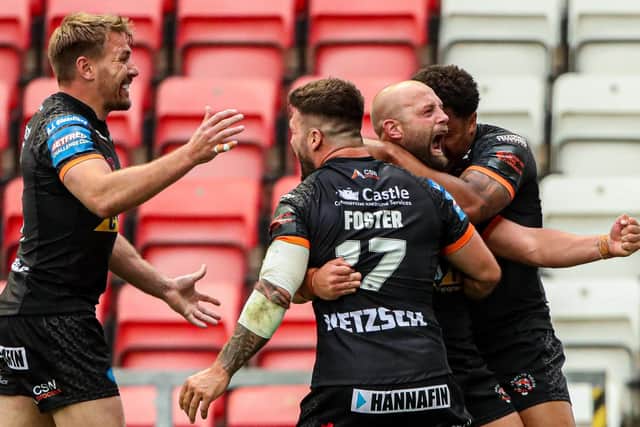 Semi-final joy: Castleford's Paul McShane is congratulated on his try by Jordan Turner, Alex Foster and Michael Shenton.