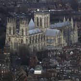 An aerial view of the centre of York, with the city's Minster dominating the skyline. A pioneering computer system has been introduced in the city to help tackle congestion and air pollution by managing traffic flows more effectively. (Picture: Owen Humphreys/PA Wire)