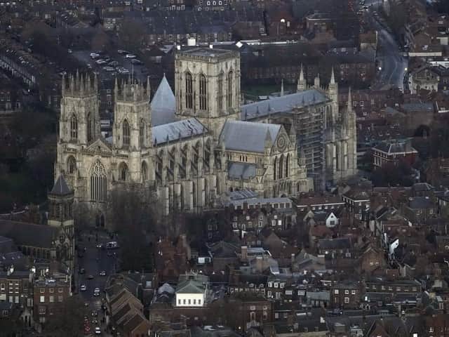 An aerial view of the centre of York, with the city's Minster dominating the skyline. A pioneering computer system has been introduced in the city to help tackle congestion and air pollution by managing traffic flows more effectively. (Picture: Owen Humphreys/PA Wire)