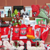 Flowers and tributes left at the Hillsborough Memorial outside Anfield stadium, Liverpool, following the collapse of the Hillsborough trial. Picture date: Wednesday May 26, 2021