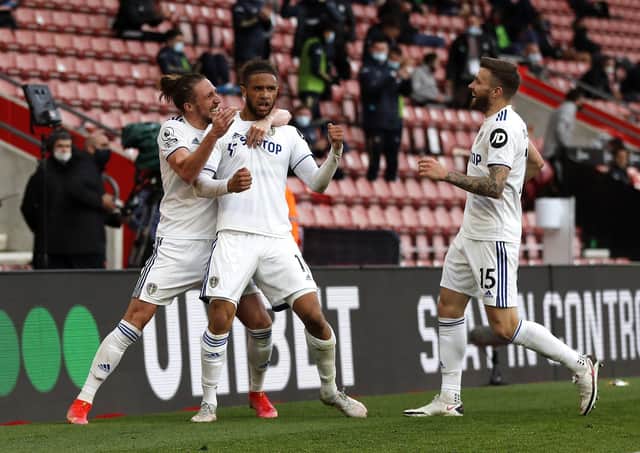 STICKING AROUND: Leeds United's Tyler Roberts (centre) celebrates scoring at Southampton. Picture: Frank Augstein/PA