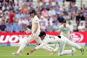 Got it: New Zealand's Will Young fields the ball off England's Dom Sibley during day one of the second Test at Edgbaston.