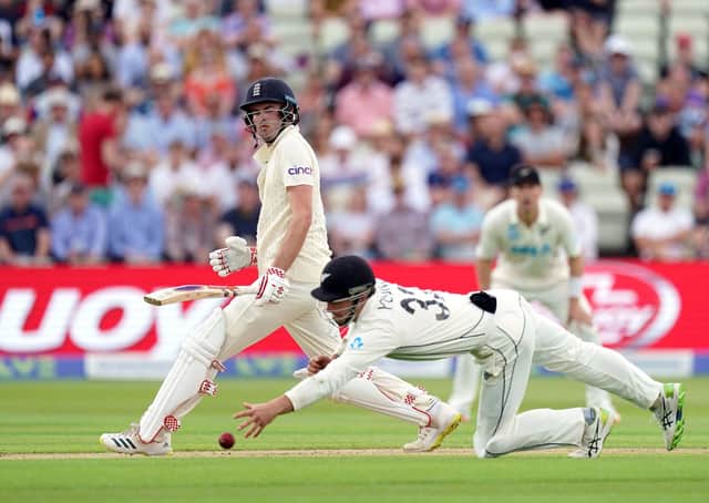 Got it: New Zealand's Will Young fields the ball off England's Dom Sibley during day one of the second Test at Edgbaston.
