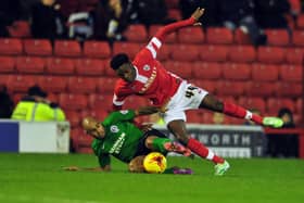 Remember me?: Barnsley’s Devante Cole being challenged by Scunthorpe’s Marcus Williams in 2014. Picture: Tony johnson