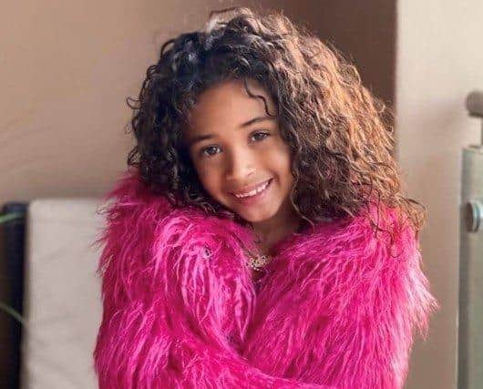 Royalty, Chris Brown's daughter, wears House of Juniors pink faux fur coat. Photo copyright: Chris Brown & House of Juniors