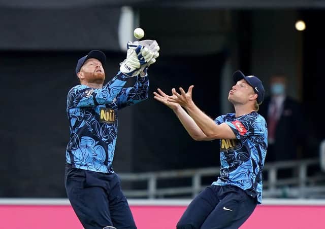Yorkshire Vikings' Jonny Bairstow (left) collides with teammate Matthew Waite but still takes the catch to dismiss Birmingham Bears' Tim Bresnan. Pictures: PA