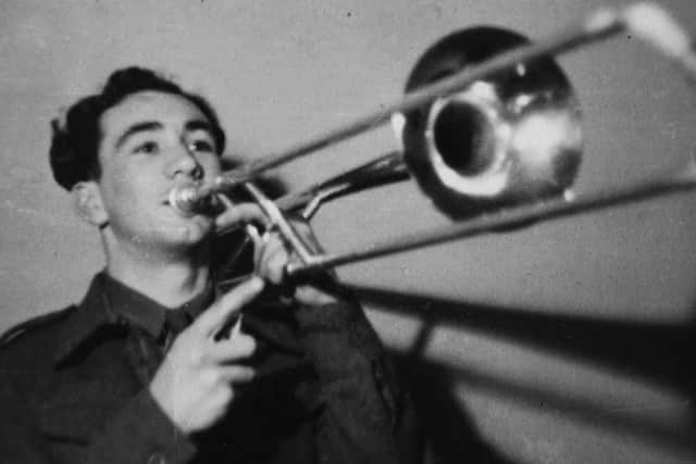 He continued to play the trumpet in a military band when he was conscripted Picture: Lorne Campbell / Guzelian