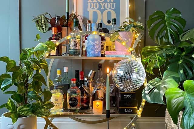 The bargain bar cart from George at Asda trimmed with fairy lights