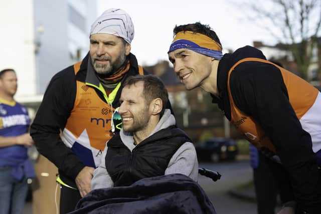 Kevin Sinfield (right) with Rob Burrow during last year's marathon challenge.