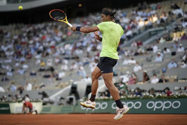 TOP TWO: Rafael Nadal returns the ball to Novak Djokovic during their semi-final AP/Christophe Ena