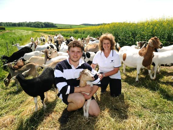 George and Sally Hurren with their goats.
