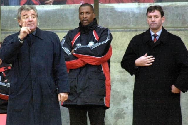 Middlesbrough's Terry Venables (left) watches the team in action with assistant manager Viv Anderson (centre) and manager Bryan Robson. Picture: PA