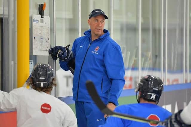 PUTTING IT INTO PRACTICE: Assistant coach Corey Neilson talks to the GB players ahead of the tournament in Riga. Picture: Dean Woolley.