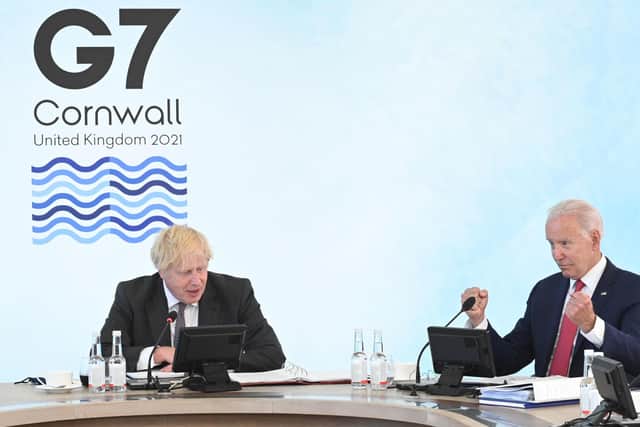 Prime Minister Boris Johnson (left) next to US President Joe Biden in Carbis Bay, during the G7 summit in Cornwall.
