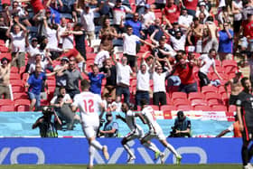 England's Raheem Sterling celebrates after scoring his side's winning goal against Croatia. (Laurence Griffiths, Pool via AP)