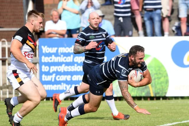 Featherstone Rovers' Thomas Minns scores a try against BRadford BUlls in Sunday's 44-0 win. Picture: Simon Hulme
