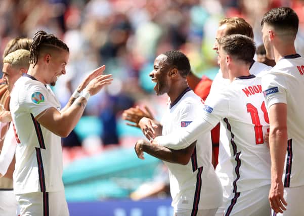 England's Raheem Sterling celebrates with Kalvin Phillips after scoring the winner against Croatia. Photos: Getty Images