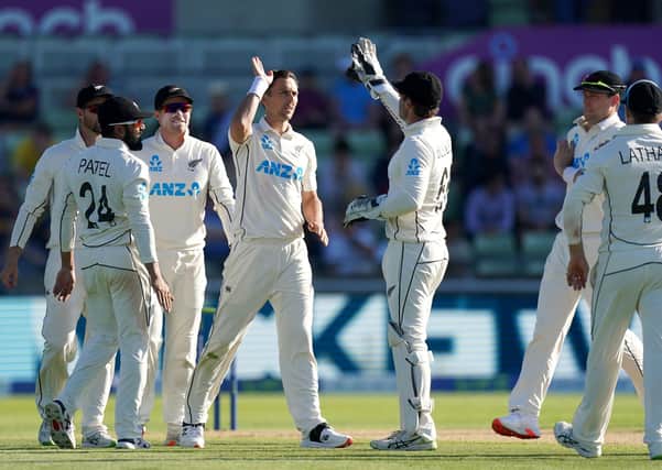 Gone: New Zealand's Trent Boult celebrates taking the wicket of England's Stuart Broad during day three.