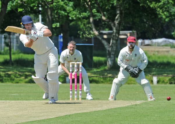 Star: Woodlands opener Sam Frankland, who scored 128 in the Bradford League win at Morley. Pictures: Steve Riding