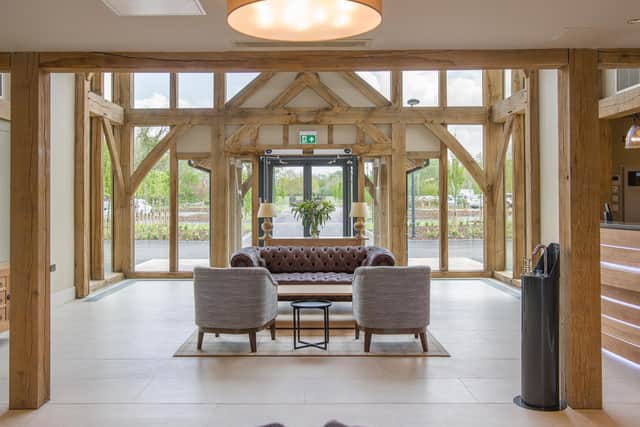 The hotel reception with the stunning green oak frame