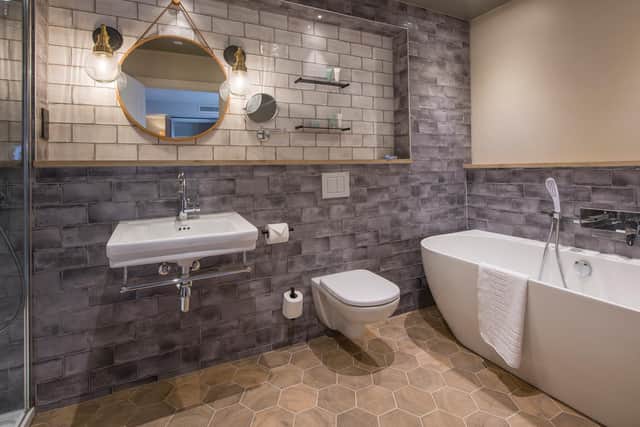 One of bathrooms in a guest suite designed by Rachel McLane