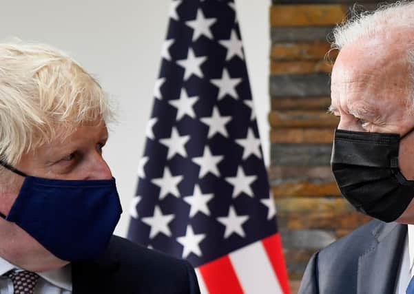 US President Joe Biden (right) talks with Prime Minister Boris Johnson during a meeting at the G7 summit in Cornwall.