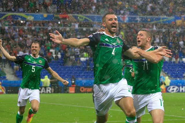Northern Ireland's Gareth McAuley celebrates with team-mates during Euro 2016.