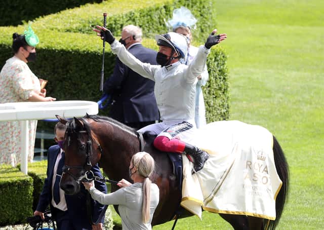 Jockey Frankie Dettori celebrates winning the Queen Anne Stakes on Palace Pier during day one of Royal Ascot.