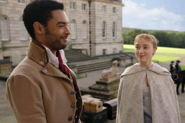 Bridgerton's Phoebe Dynevor and Regé-Jean Page in a scene filmed at Castle Howard. (Credit: Netflix)
