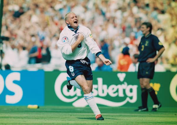 Paul Gascoigne celebrates after scoring the second goal during the European Championship group match between England and Scotland at Wembley, on June 15 1996. England won the match 2-0.   (Photo by Stu Forster/Getty Images)