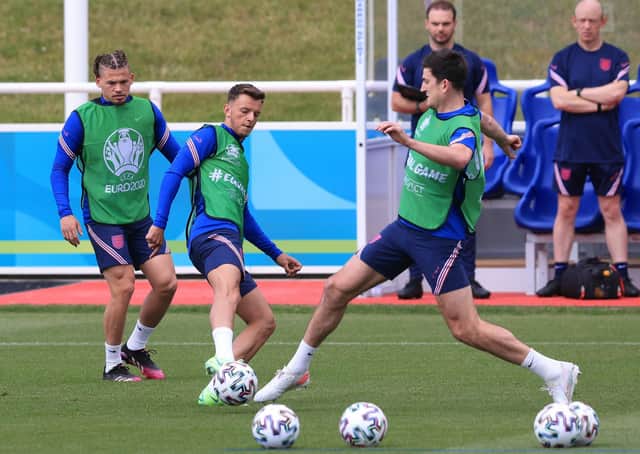 Kalvin Phillips, Ben White and Harry Maguire of England in training. (Photo by Marc Atkins/Getty Images)