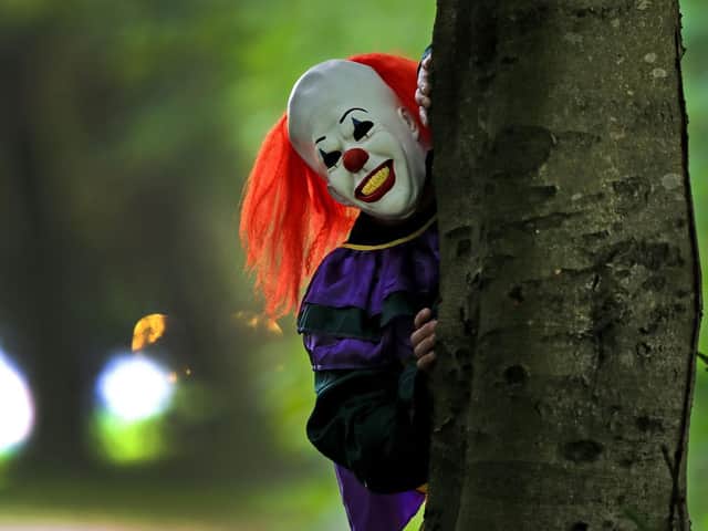 A person wearing a clown costume in Liverpool in 2017, when warnings were made that a new film adaptation of Stephen King's IT would leave a new generation scared of clowns.