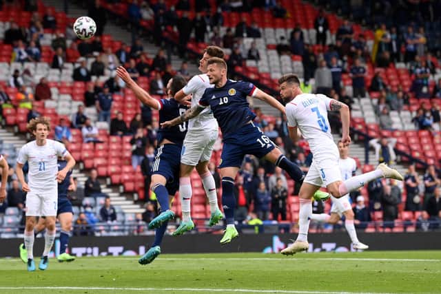 Patrik Schick scores the Czech Republic's first goal under pressure from Scotland's Liam Cooper at Hampden Park on Monday. Picture: Stu Forster/Getty Images