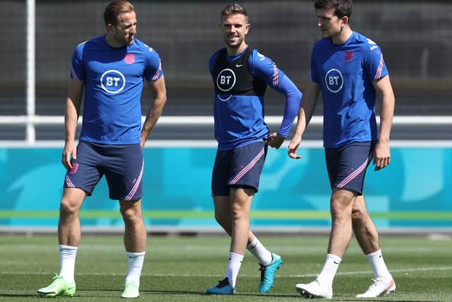 FIGHTING FIT: Harry Kane, Jordan Henderson and Harry Maguire of England take to the field during an England training Session at St George's Park. Picture: Eddie Keogh/Getty Images