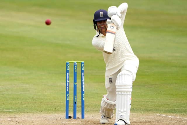 England's Sophia Dunkley drives through the covers during day two at the Bristol County Ground. Picture: Zac Goodwin/PA