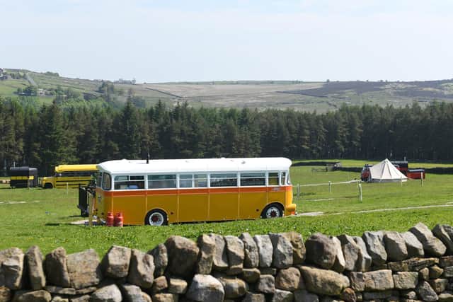 Johnny Vegas' bus sits in the field he has hired for the filming of his TV show about glamping