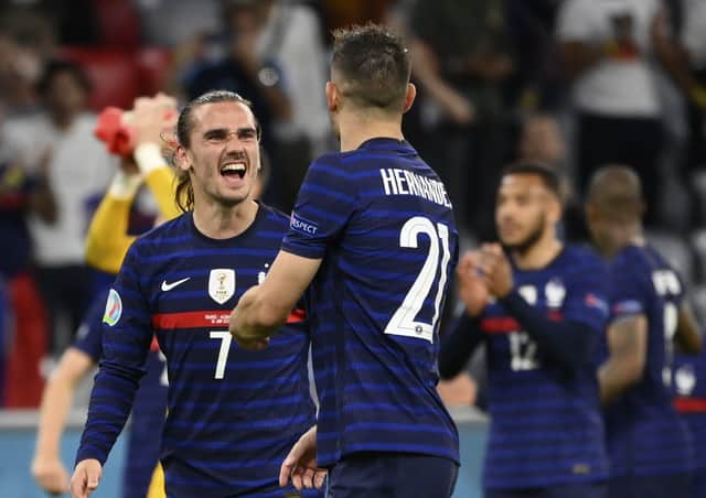 WINNERS: France's Antoine Griezmann, left, and Lucas Hernandez celebrate after beating Germany in Munich. Picture: Franck Fife/Pool via AP