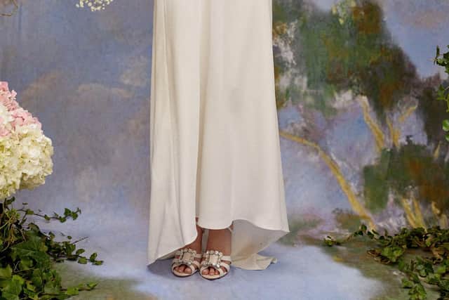 Zeta wedding dress, £875; overblouse with feathers, £350, at rixo.co.uk.