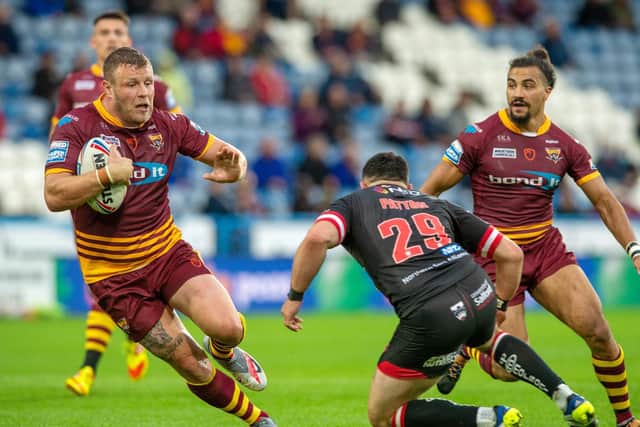 Huddersfield Giants' Josh Jones, the former Salford Red Devils second-row, takes on their opponents. (BRUCE ROLLINSON)