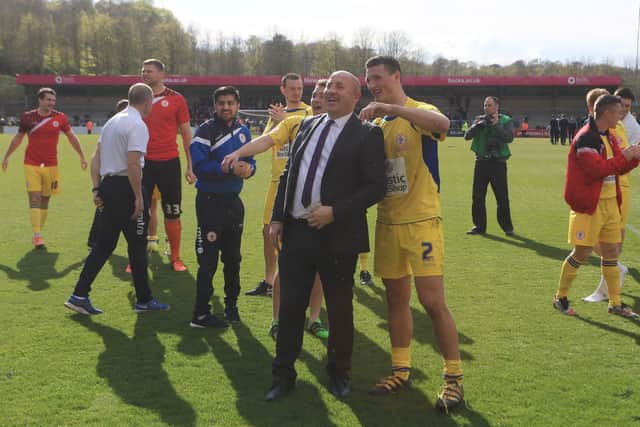 GOOD TIMES: Matty Pearson celebrates with Accrington Stanley manager John Coleman after beating Wycombe Wanderers at Adams Park. Picture: Catherine Ivill - AMA/Getty Images